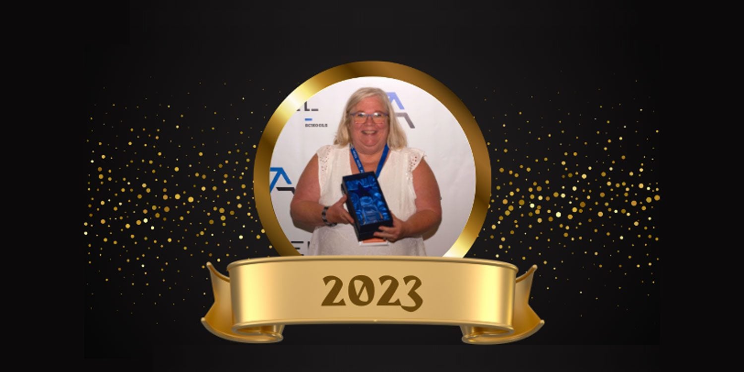 Smiling adult holding an award, framed by gold circle and confetti.
