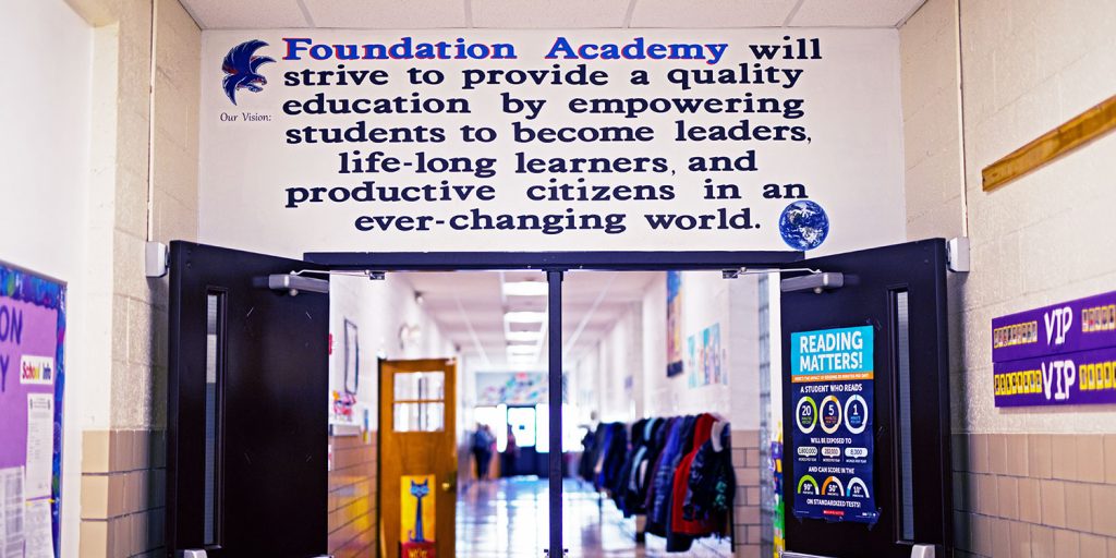 Entrance to Foundation Academy hallway painted with the school vision statement.